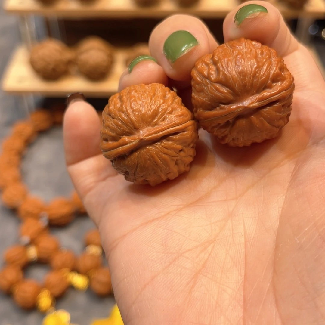 文玩核桃把件红皮小磨盘