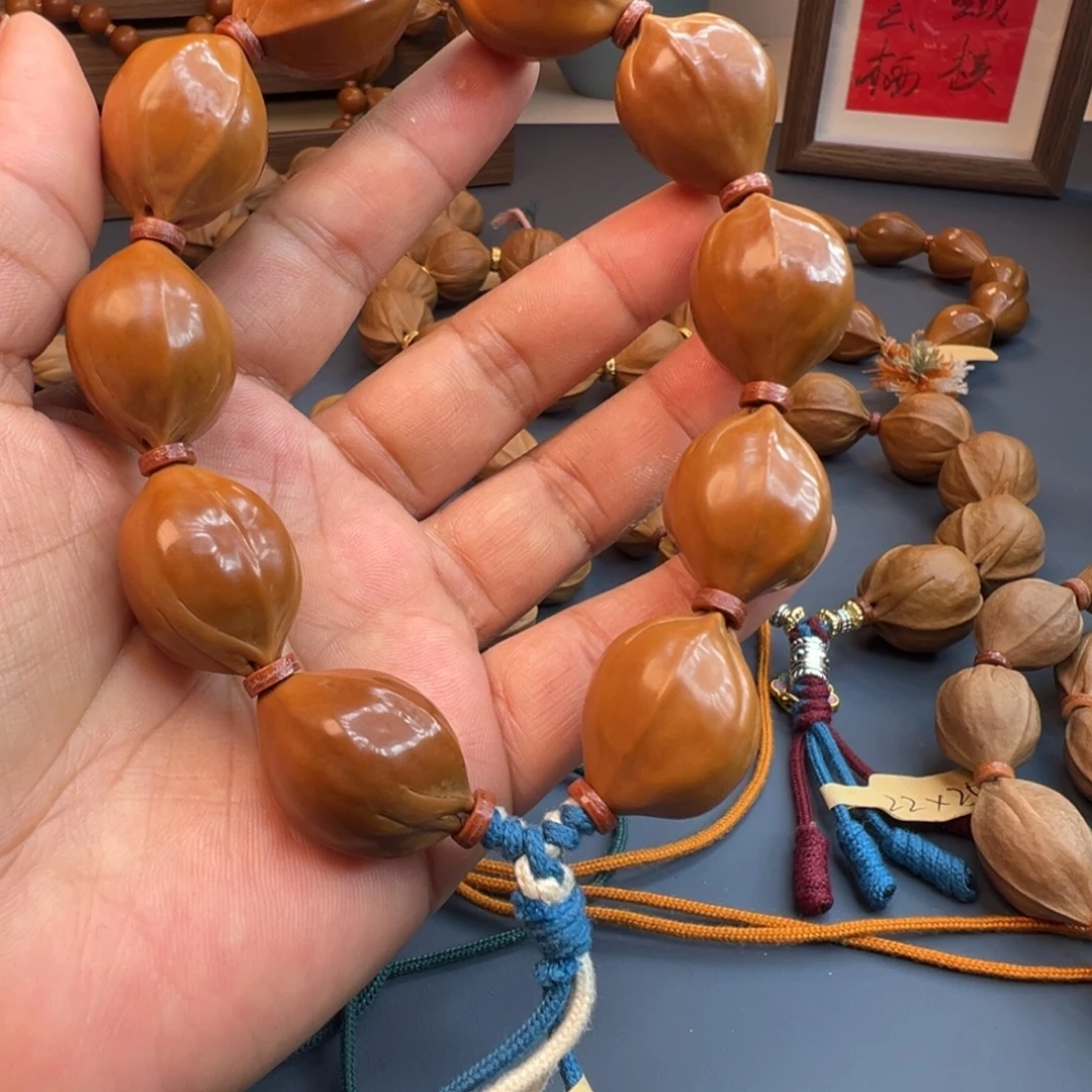 甄***能手串橄榄核梅林铁核鲨鱼背抛光 19×24