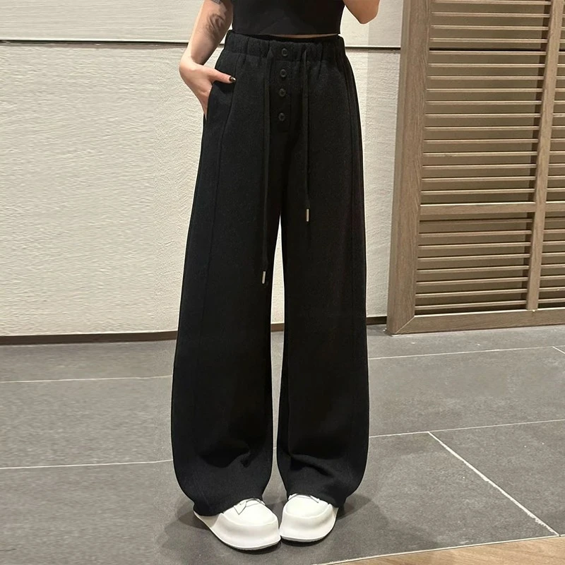 设计感四粒扣阔腿卫裤女2025秋冬新款宽松垂感休闲直筒抽绳长裤子