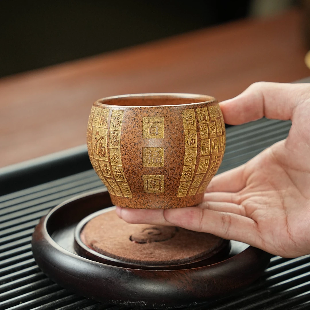 宜兴原矿柴烧龙骨金砂柴烧手工刻绘百福图紫砂主人杯