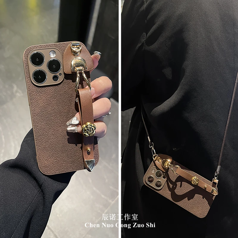 适用苹果/华为荣耀oppo/vivo小米手机壳月坑纹棕色手腕带斜挎绳女