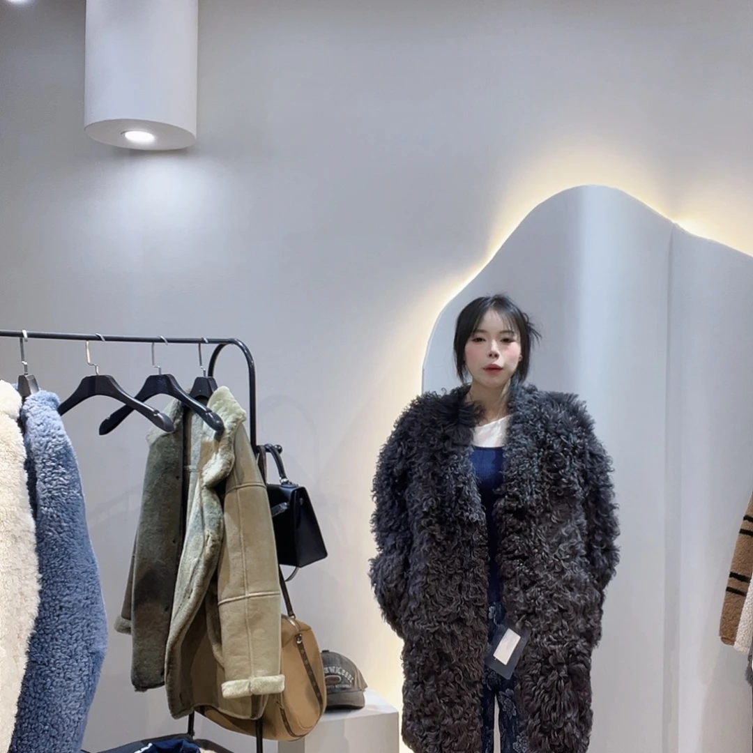 真皮皮毛一体外套222-3315。125斤内