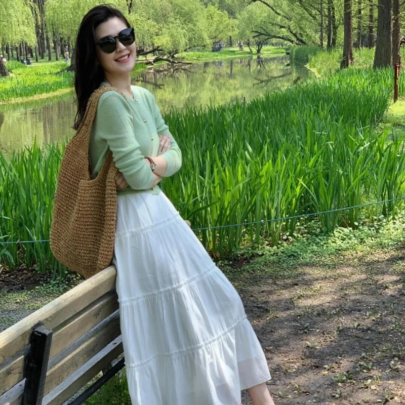 茶系穿搭一整套梨形身材盐系针织开衫女春夏韩剧白色半身裙两件套