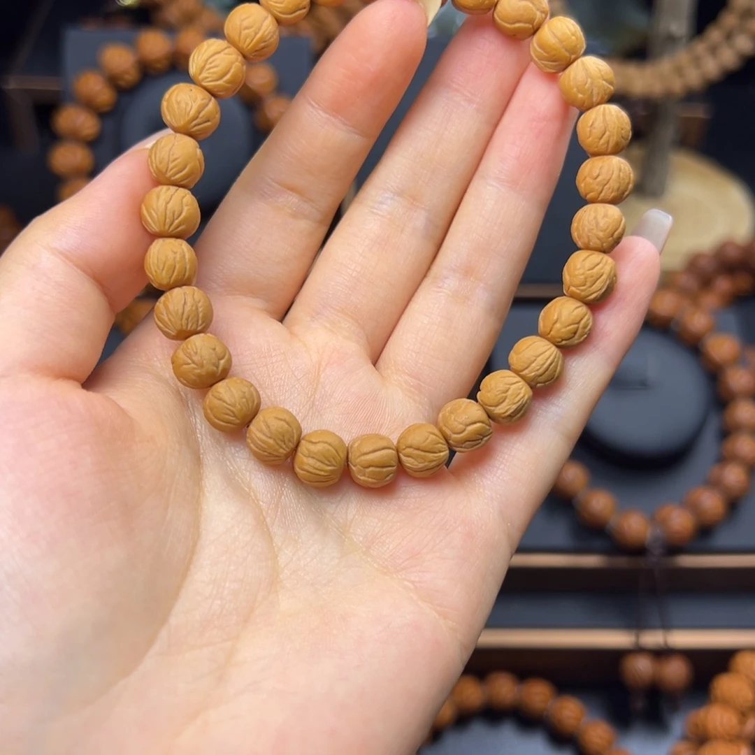 米****手串桃核野生玉龙脊0.9