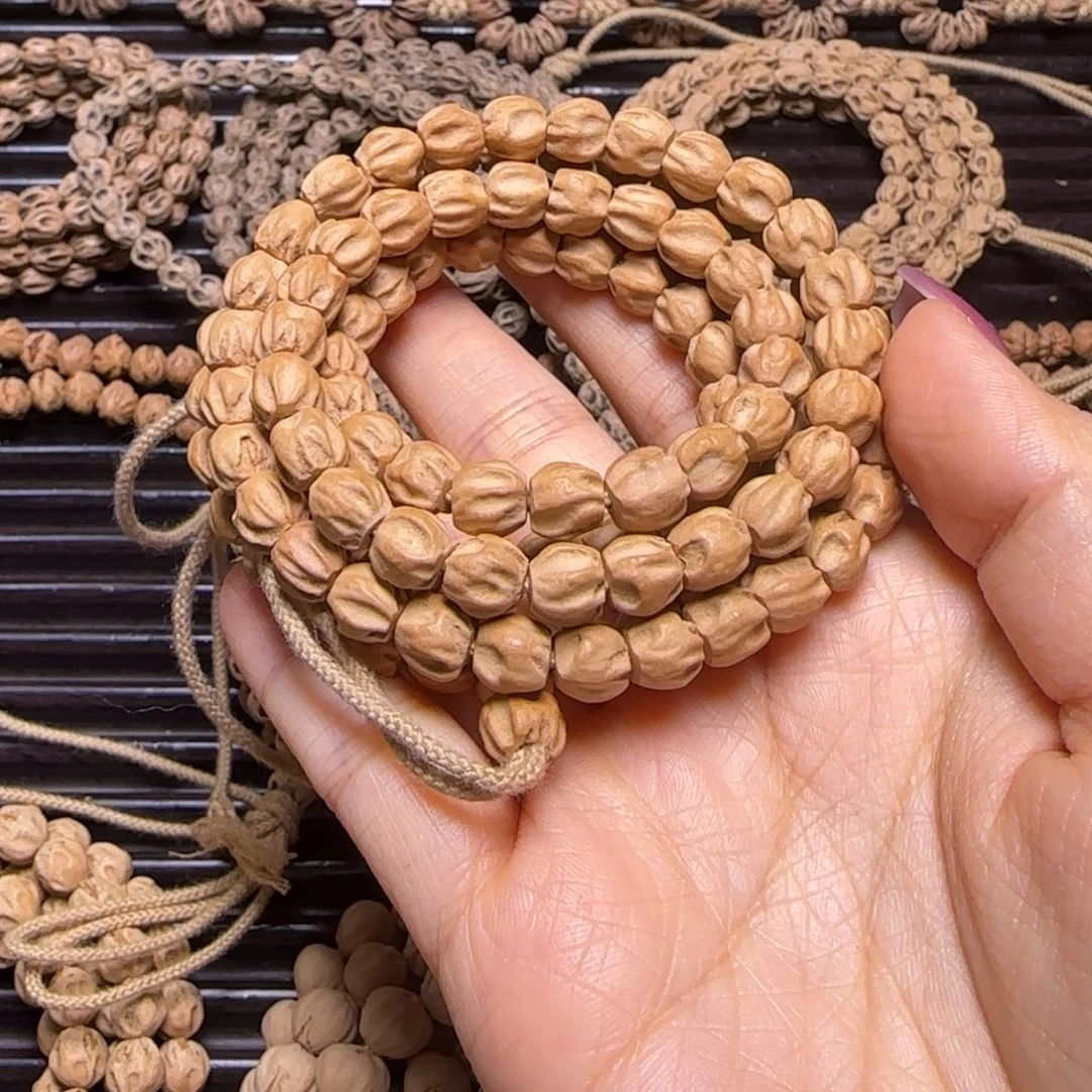 爱***己柏香籽/百香籽吊坠