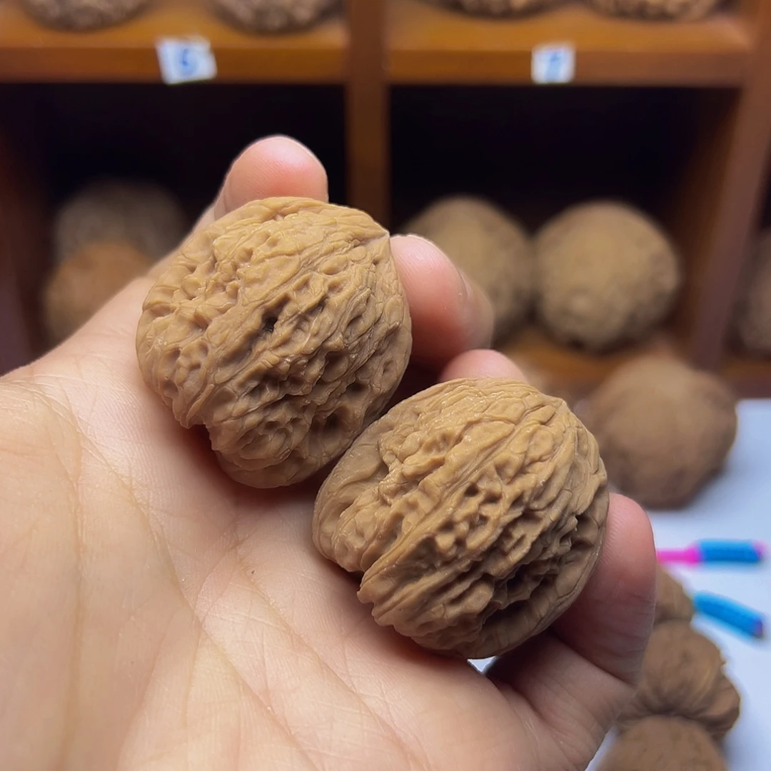 桃核吊坠34凹底高炮有黄南疆石