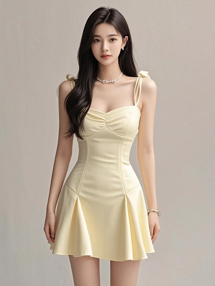 【KEKE】度假风黄色吊带连衣裙女2025新款纯欲性感气质A字短裙子