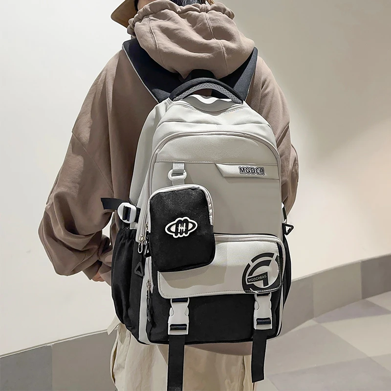 中高学生书包大容量小学男女生双肩包儿童轻便潮酷背包百搭电脑包