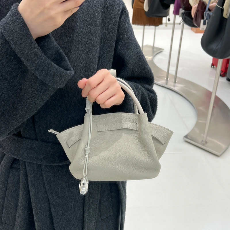 希哥家 新款小众设计高级感饺子包时尚手提菜篮子包百搭斜挎9015