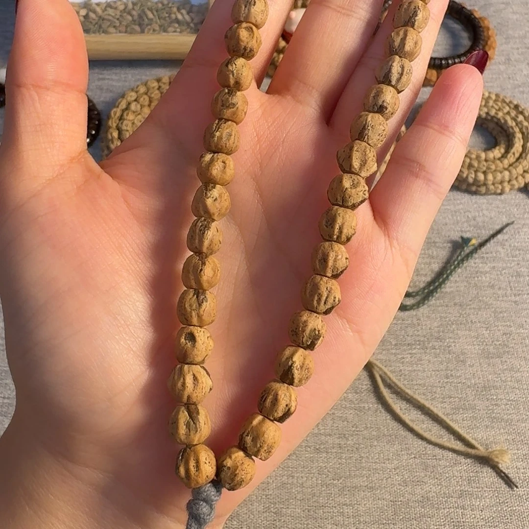柏香籽/百香籽吊坠手持