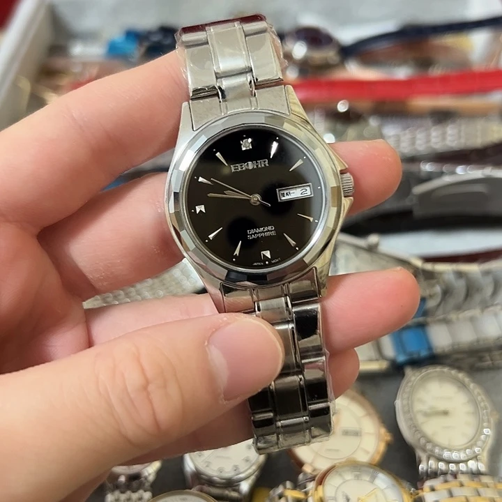 郑***)钢牛皮（革）钢石英机芯111