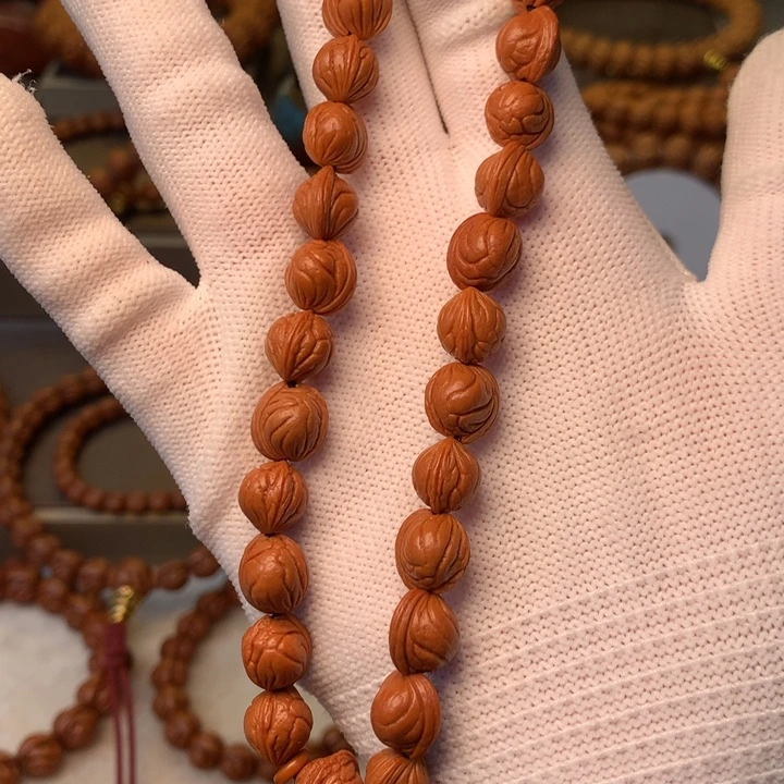 蓝***轩桃核手串秦岭龙纹