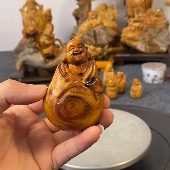 柏木（崖柏）弥勒佛手把件