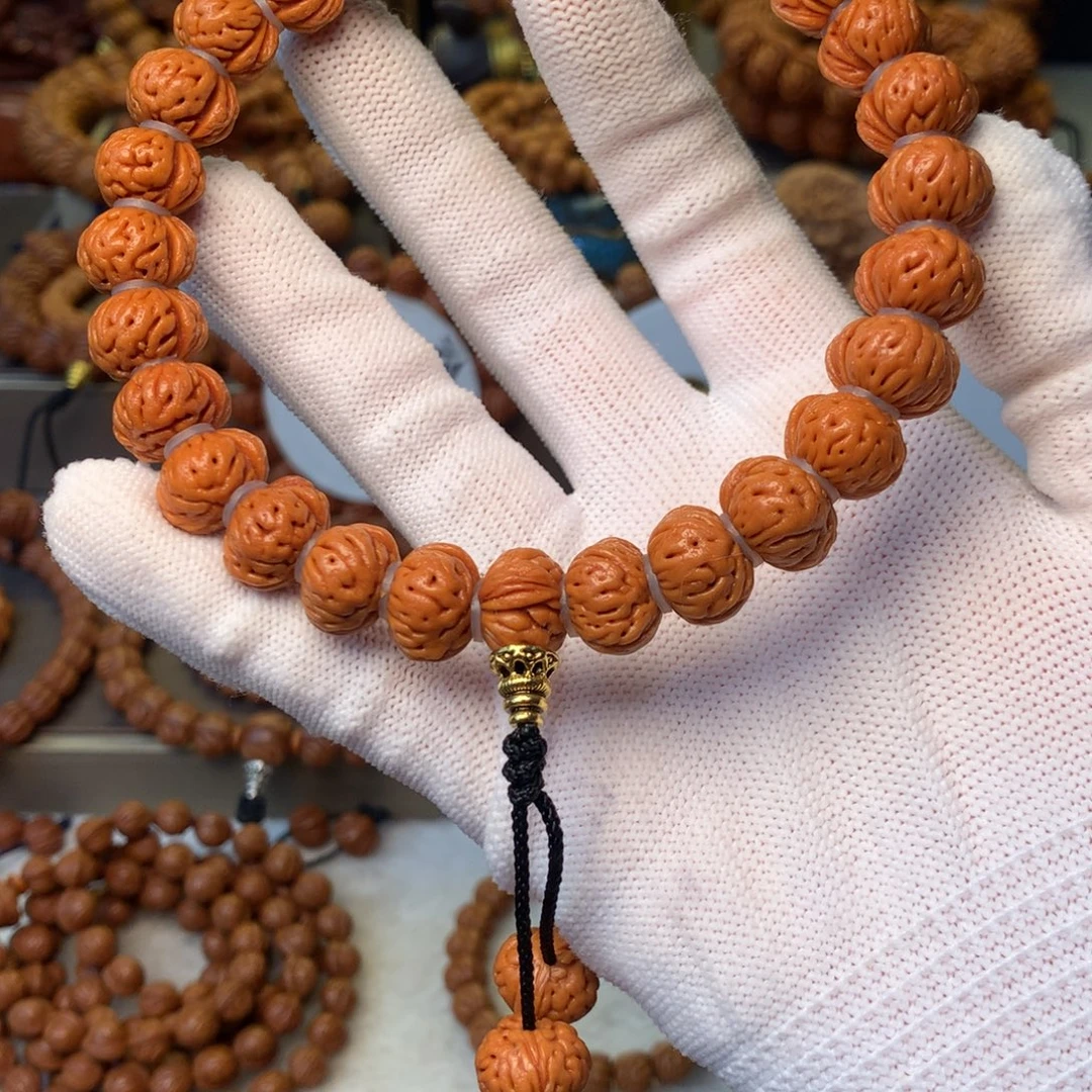 像***行桃核手串秦岭龙纹