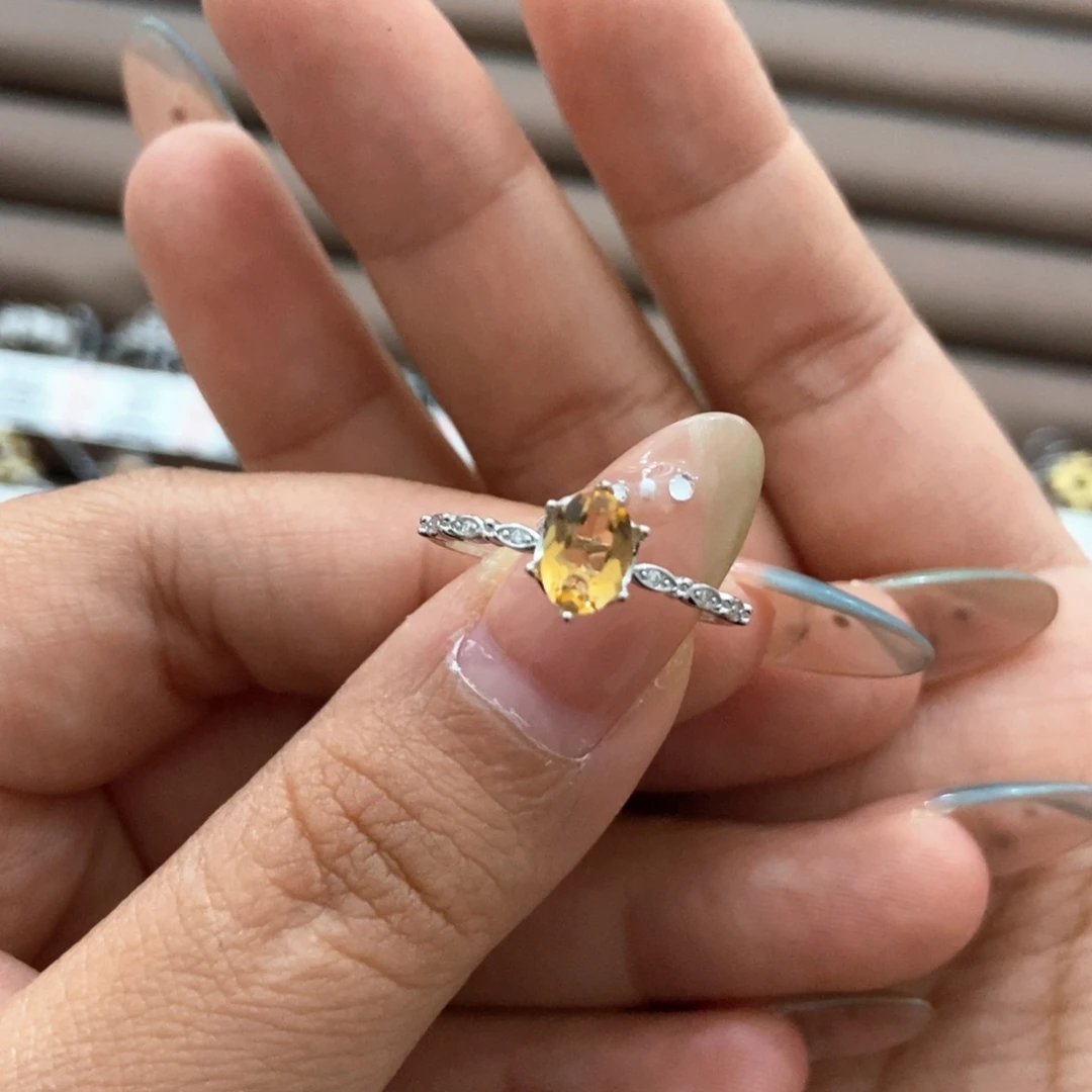 亦****银S925镶嵌戒指黄晶顾客还有一个红尖晶戒指一起发走