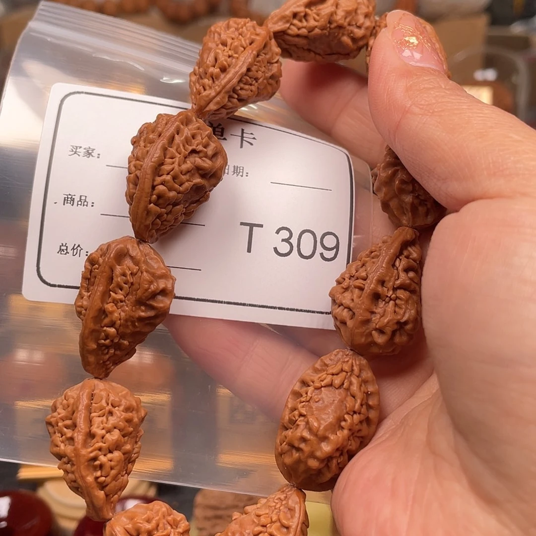 文玩核桃吊坠浮***生麒麟角 309