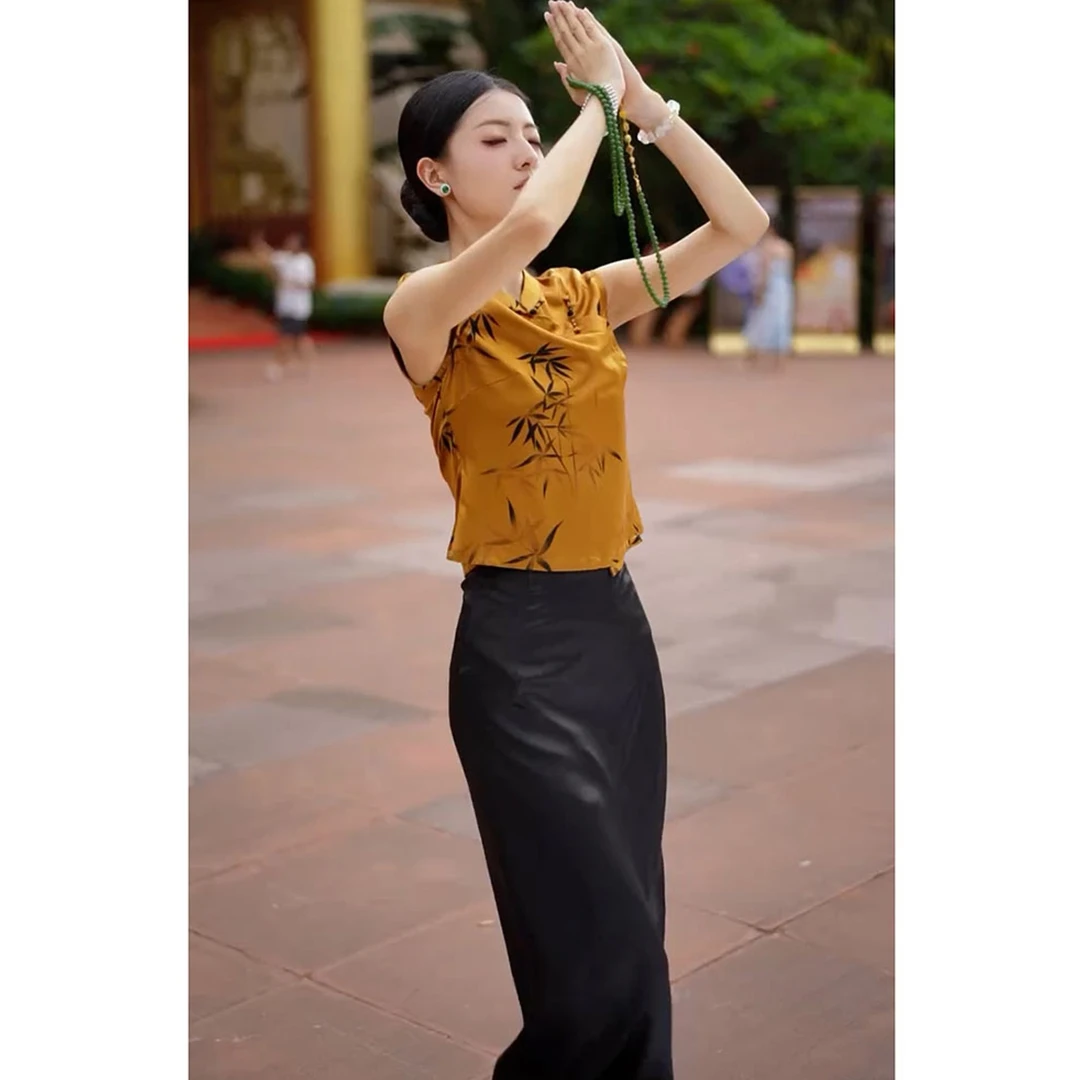今年流行新中式国风茶里茶气别致上衣轻奢高级感黄色印花衬衫女秋