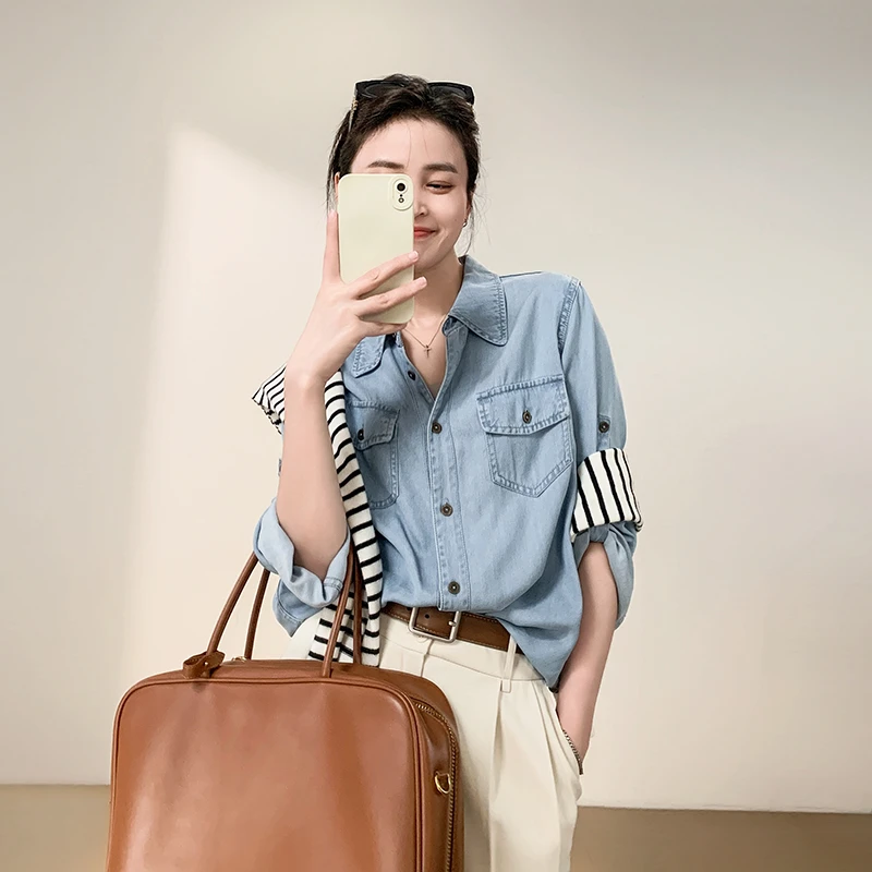 天丝牛仔衬衫女长袖2025春秋季新款休闲宽松薄款浅蓝色上衣女