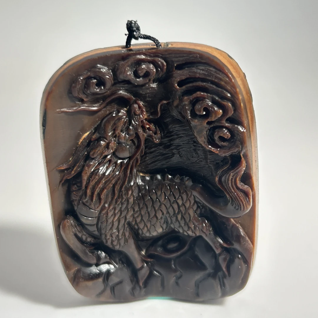 猛犸牙雕深冰咖麒麟吊坠牌54*41*8mm假一罚四X2508