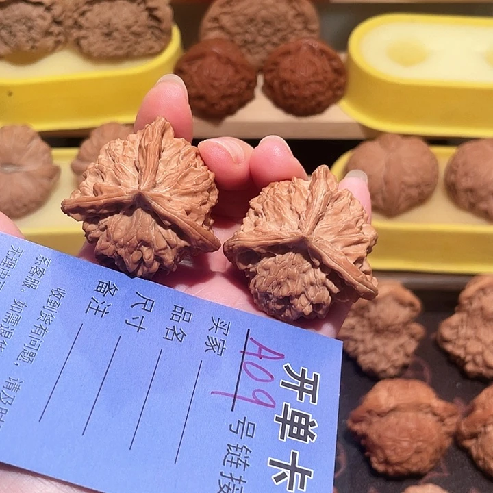 文玩核桃把件笑***?三棱