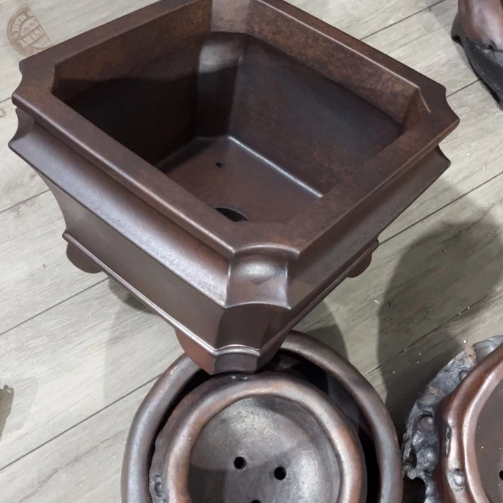 阿***一紫砂花盆宜兴紫砂工艺厂。