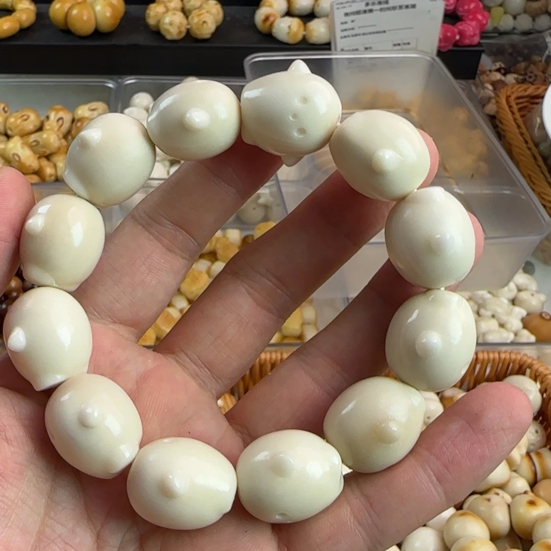 咕***咕手串菩提根/象牙果瑕疵一条