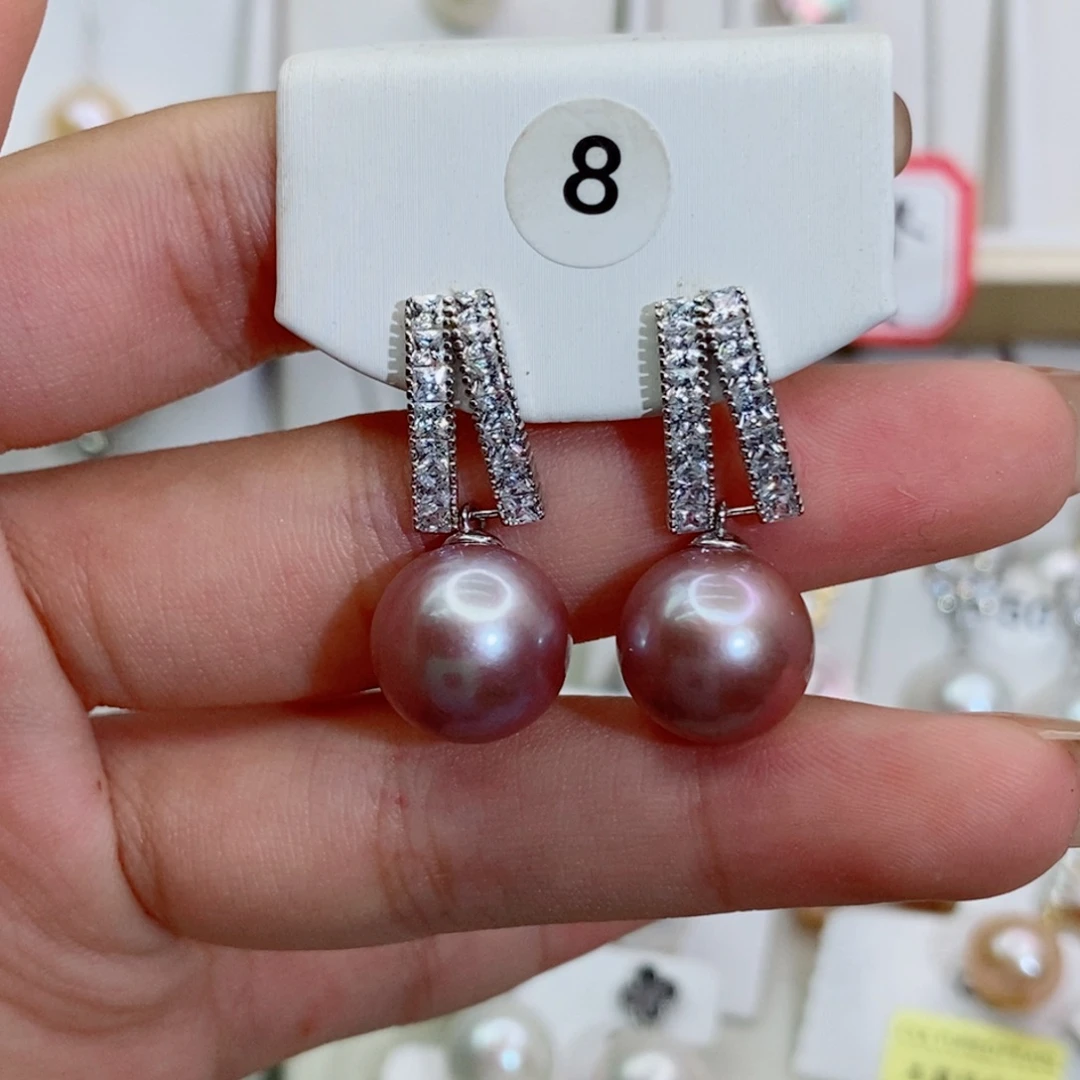 丑***丫银S925镶嵌淡水珍珠耳饰