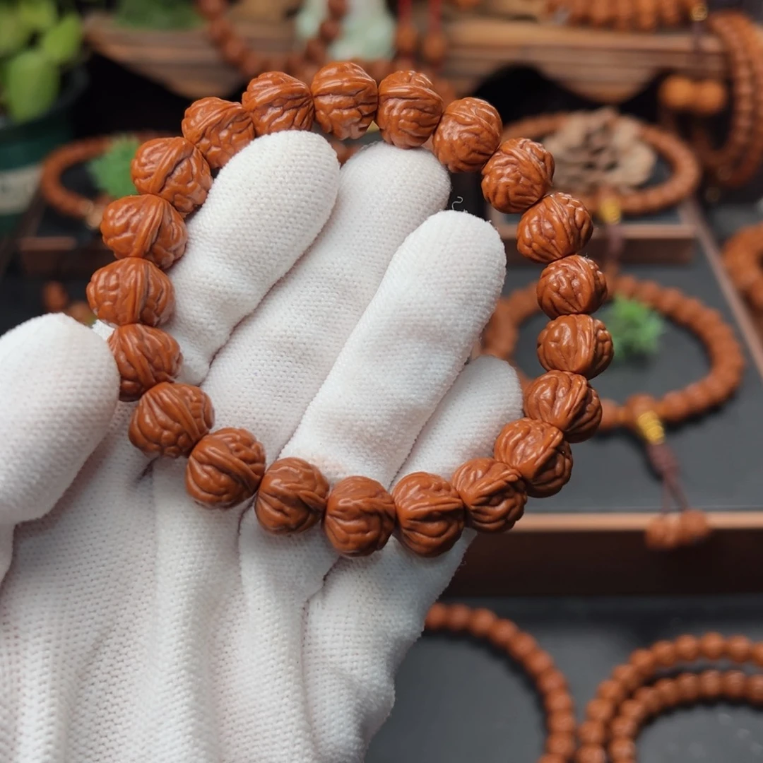 吊坠桃核雪1.4顶货双脊龙手串