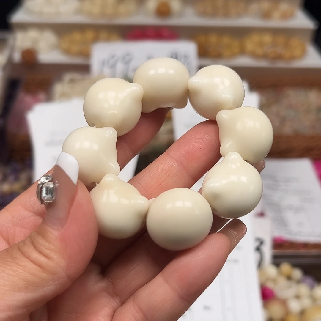 菩提根/象牙果手串微瑕卡20左右白色猫头8颗有裂