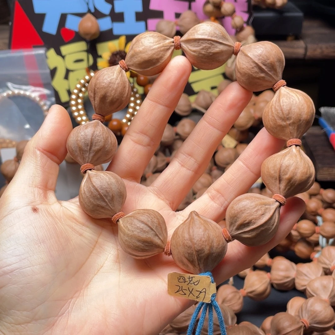 L***唐橄榄核吊坠2529四花铁核