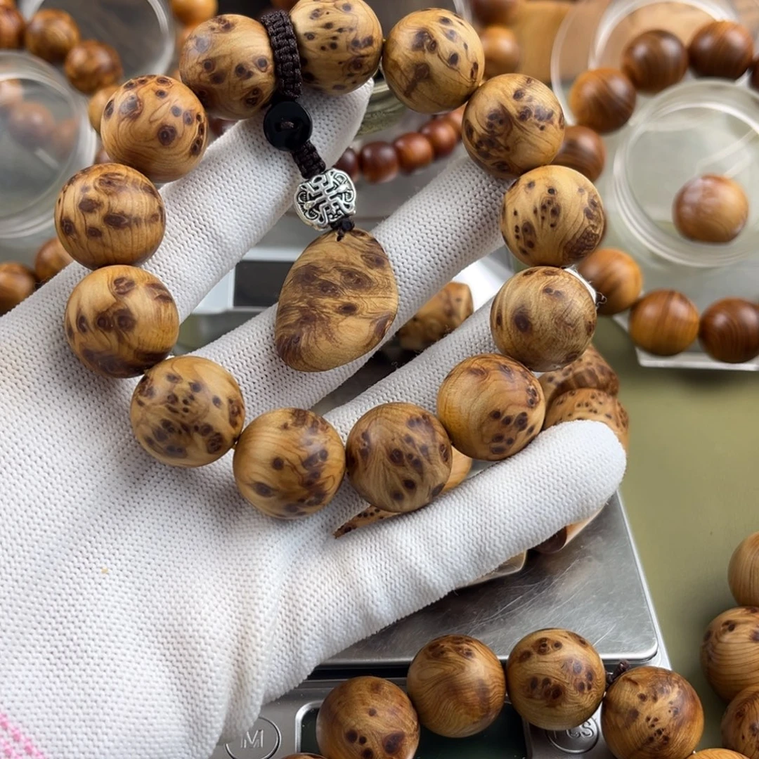 亮****无事牌柏木1.8瘤疤