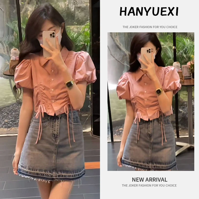 今年流行穿搭一整套2025新款立领抽绳泡泡袖设计上衣牛仔短裙套装
