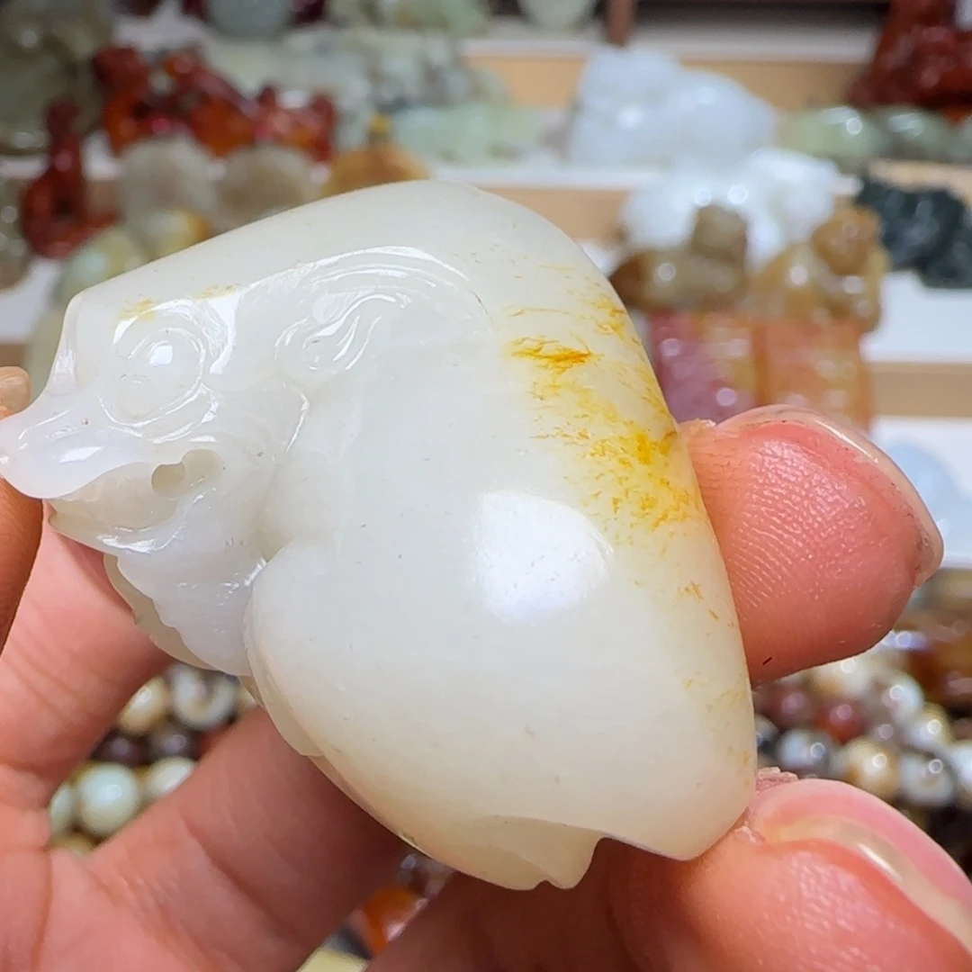 石***)和田玉未镶嵌挂件