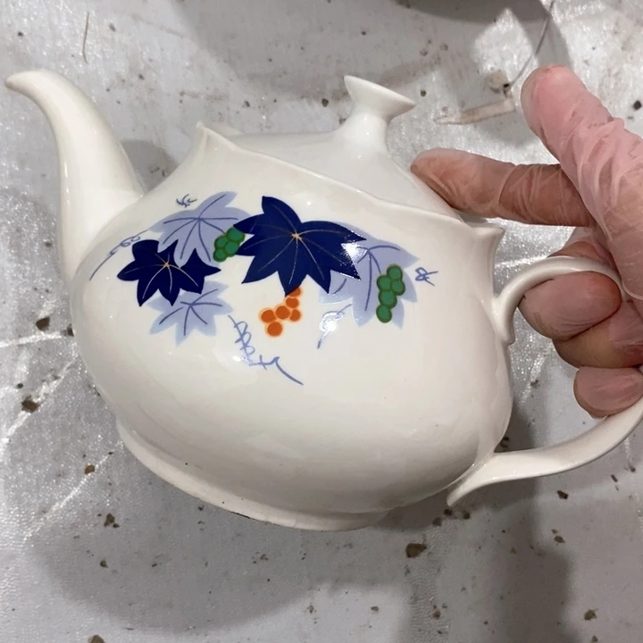 瓷片白玫牌多孔壶