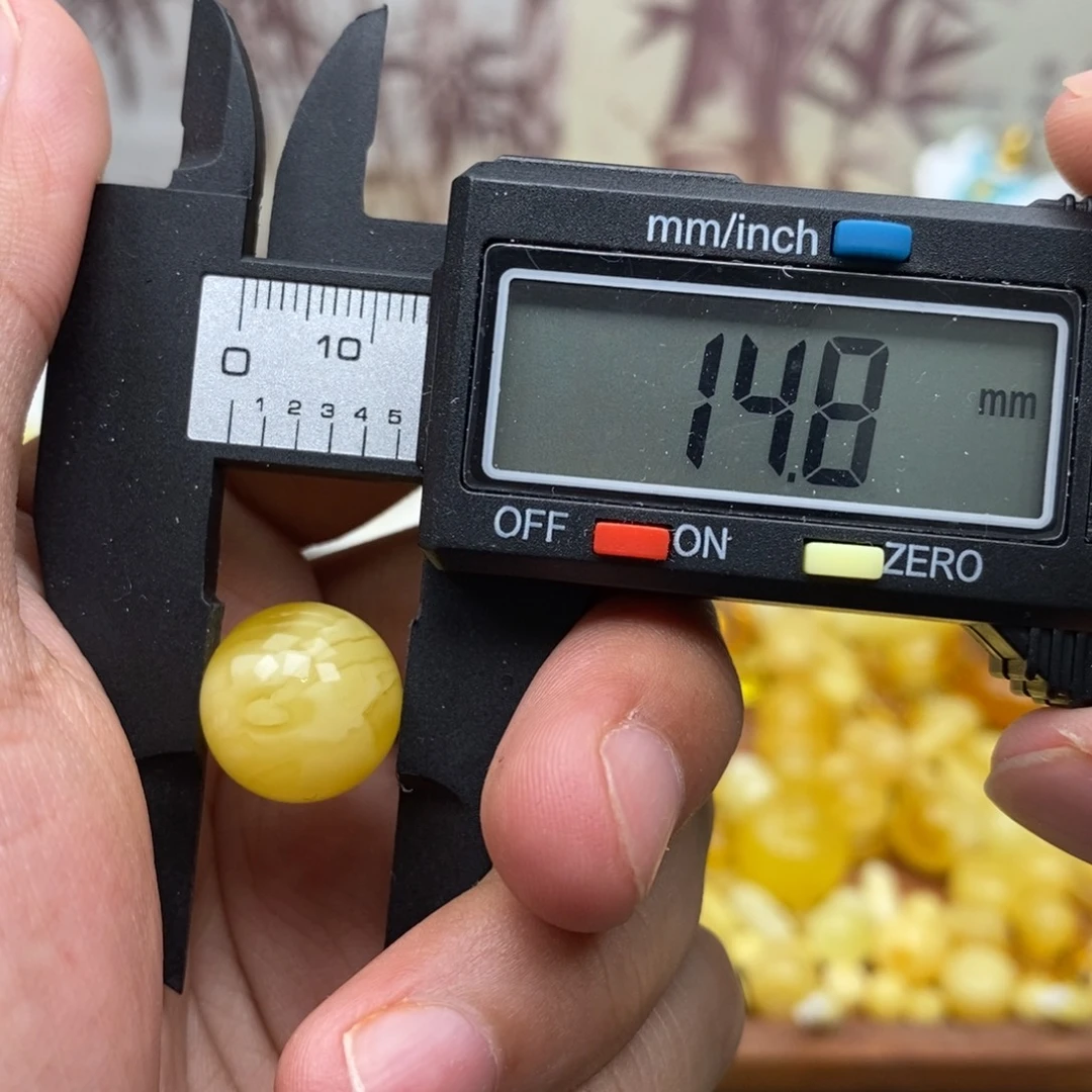 庆***告琥珀未镶嵌珠宝奇石