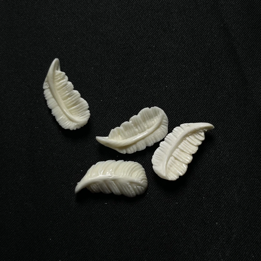 P3608 羽毛侧挂 只做天然猛犸牙 约长度20*宽度10mm