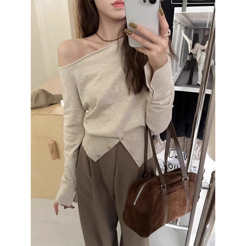 韩系慵懒温柔一字肩斜肩针织衫春季款不规则开衩长袖上衣设计感