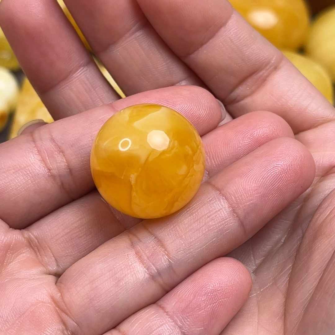 蜜蜡裸石未镶嵌低**笑珠