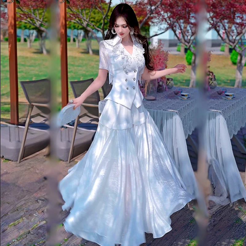 夏季设计感提花上衣拼接大摆裙两件套2025新款波西米亚减龄套装