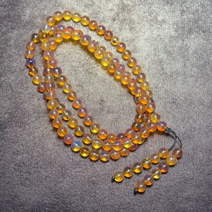 琥珀未镶嵌珠宝奇石5.8mm茶蜜