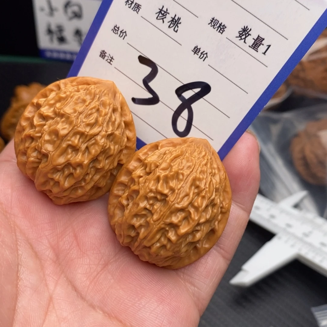 把件桃核金牛34ooooo