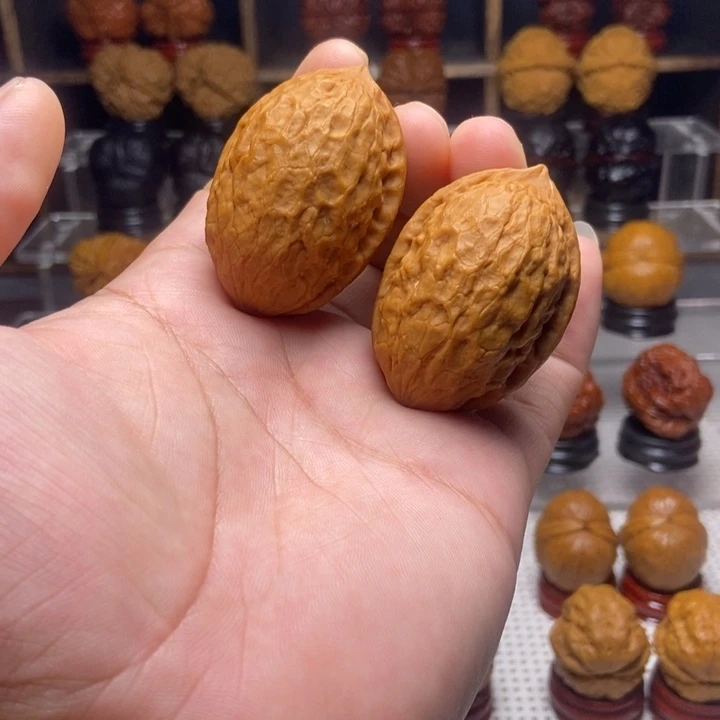 桃核把件4乾坤指的