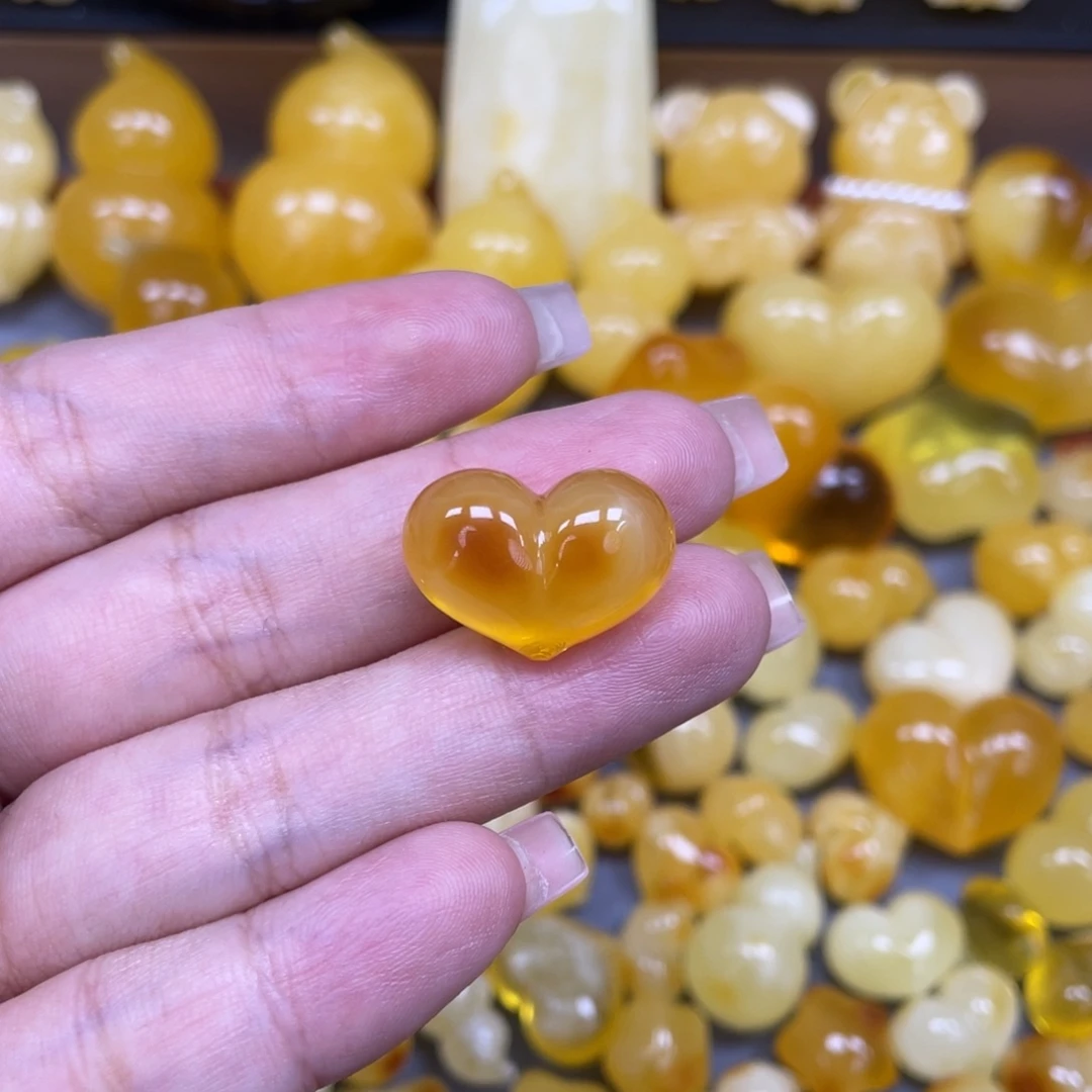 飘***你琥珀未镶嵌珠宝奇石