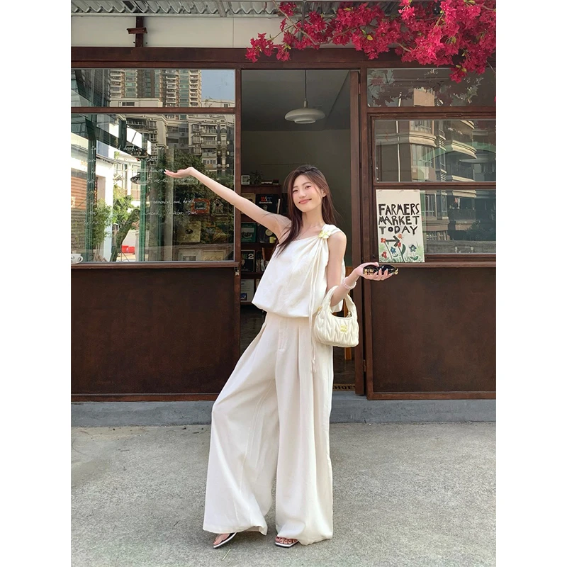 辣妹斜肩纯欲金色蝴蝶结绑带上衣设计感高腰宽松休闲裤子时尚套装