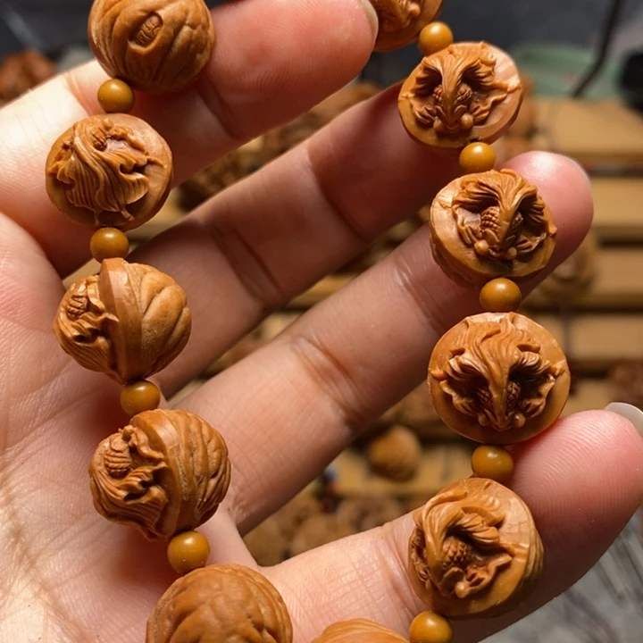 桃核手工雕刻金鱼手串