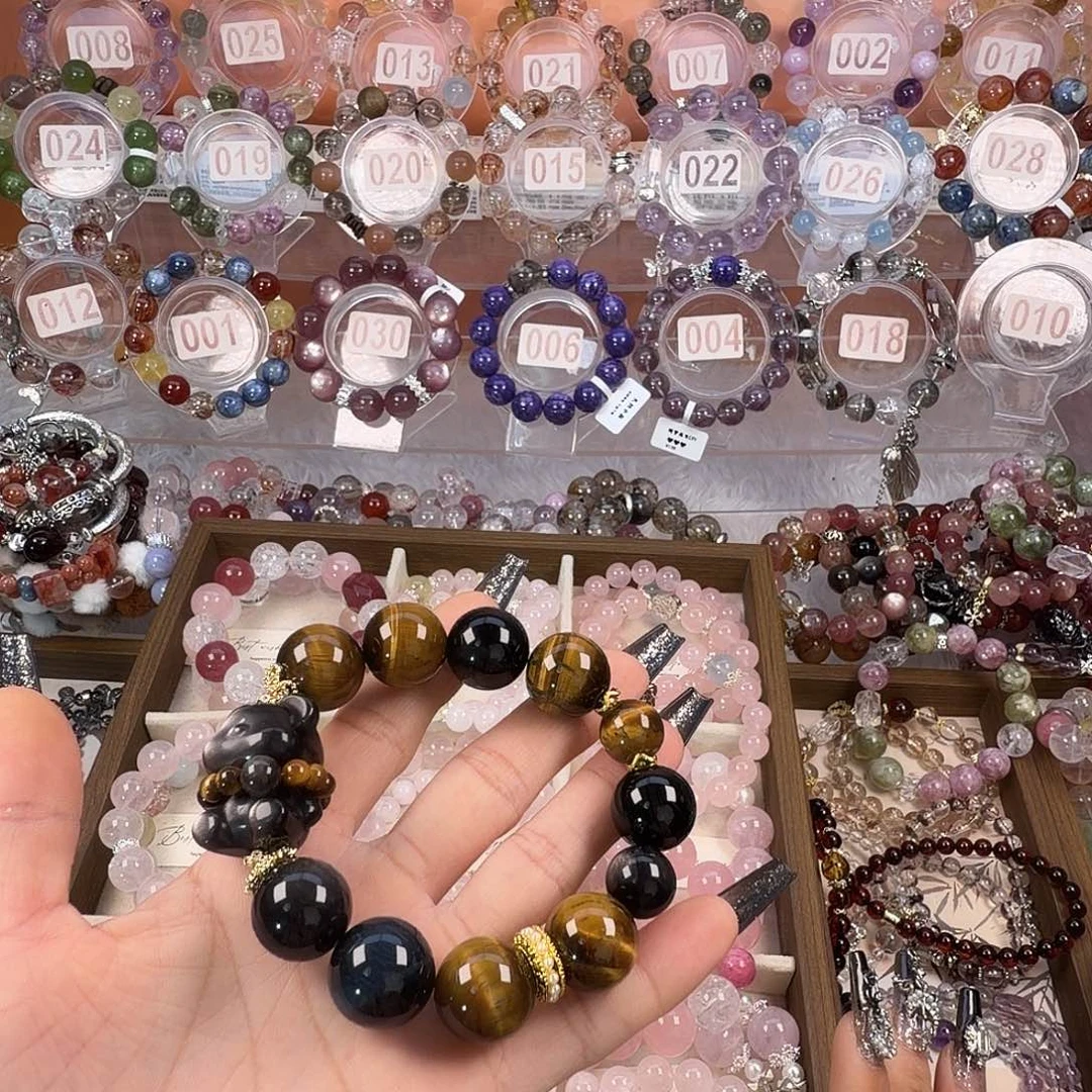 羽***墨银S925镶嵌烟晶手链