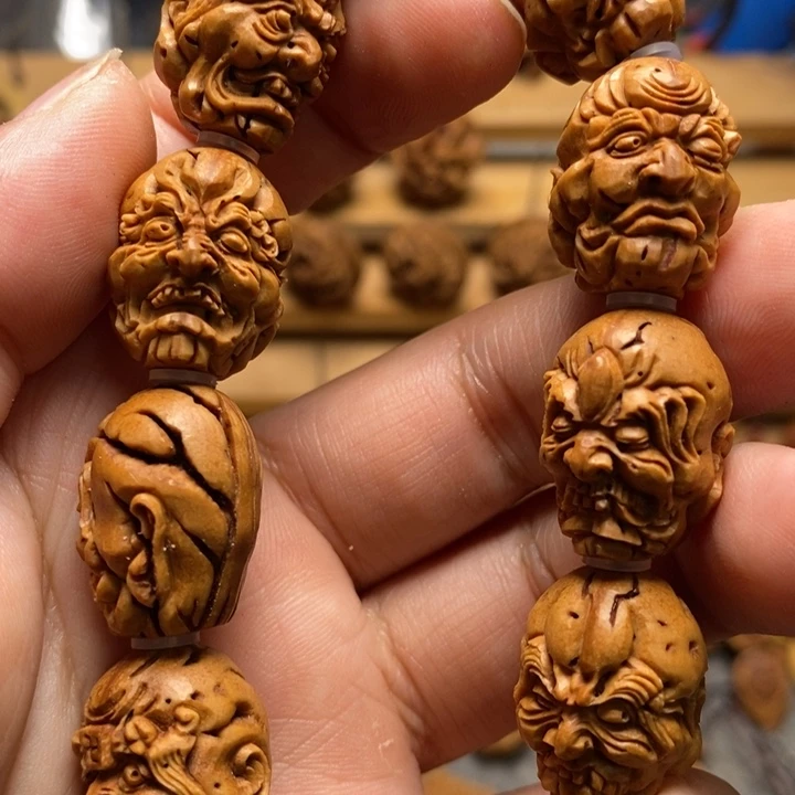桃核手工雕刻罗汉手串