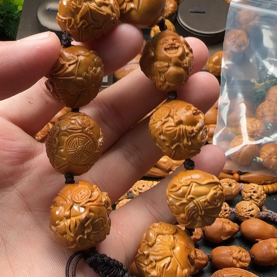 陈***生橄榄核手串/手链荷财神