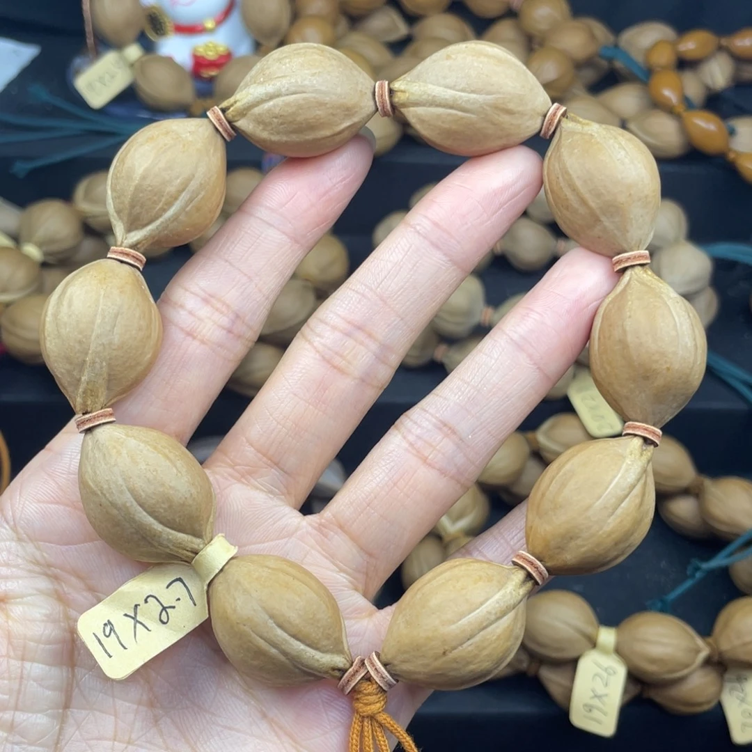 006橄榄核三花19*27