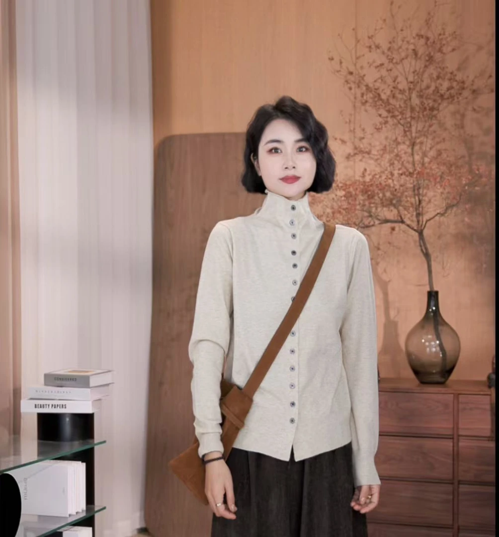 孜禾秋冬定制雀羽绒毛衣一排扣女减龄百搭时尚